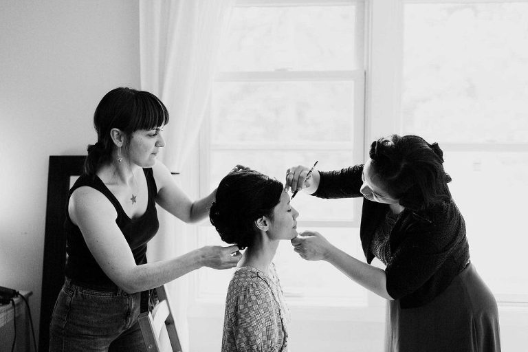 Black and white bride getting ready